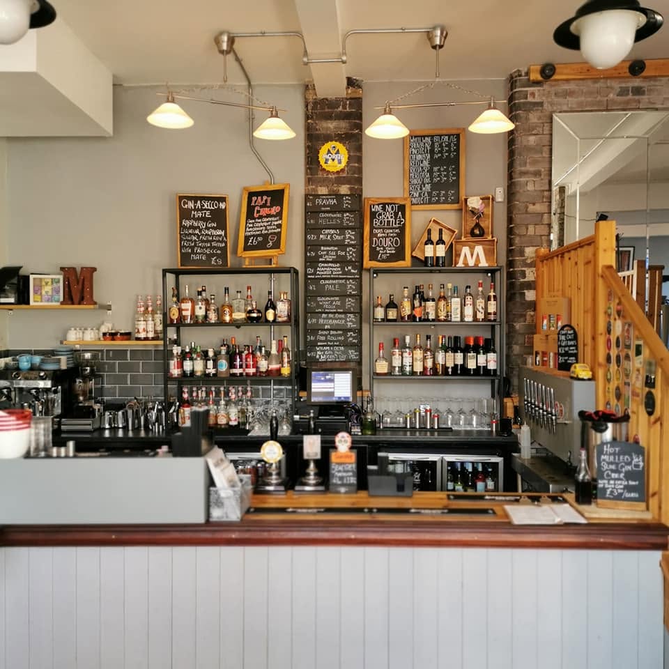 Mellards Bar taproom with 10 rotating keg taps and 3 rotating cask and reclaimed wood interior